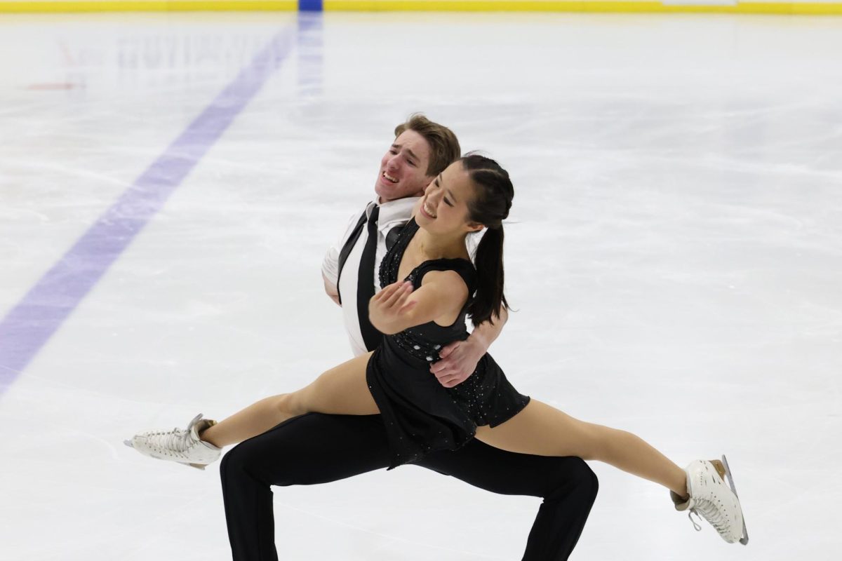 Simon Mintz and Annie Huang perform a lift during free dance at Skate Detroit. Credit: Cynthia Slawter Photography